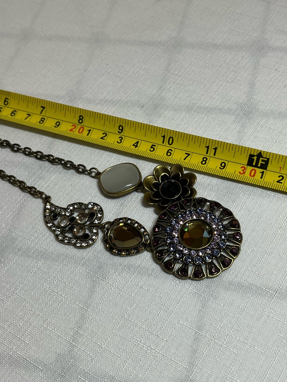 Floral & Medallion Necklace in Gold with Amber and White Accents
Bold
Statement - Picture 5 of 5